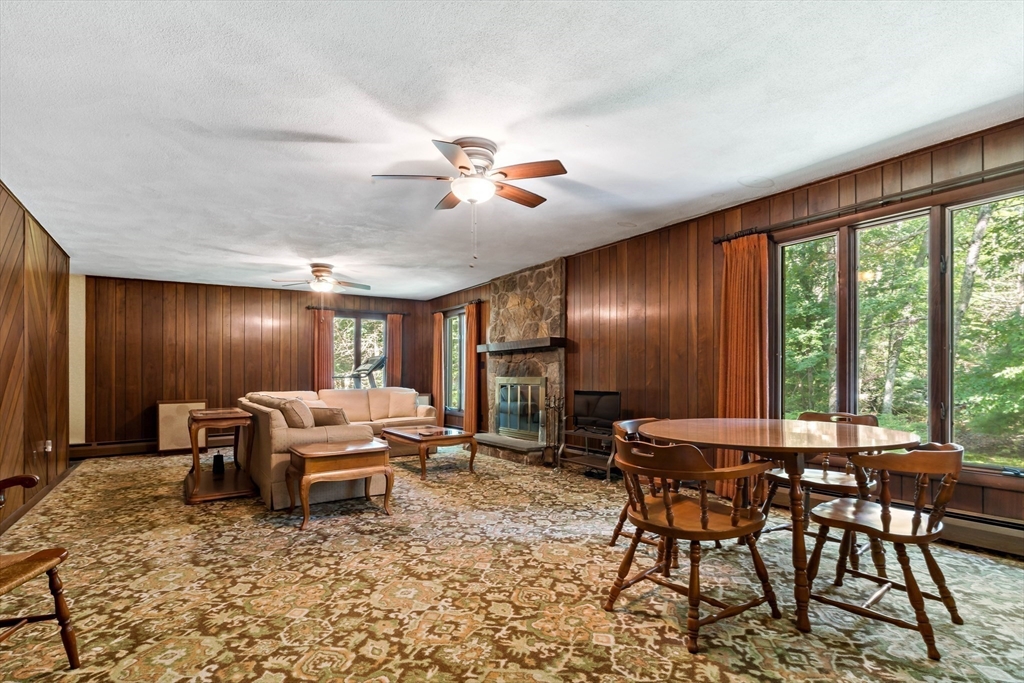 26 Danforth Street Rehoboth, MA 02769 - Photo 9 of 30 a view of a livingroom with furniture window and outside view