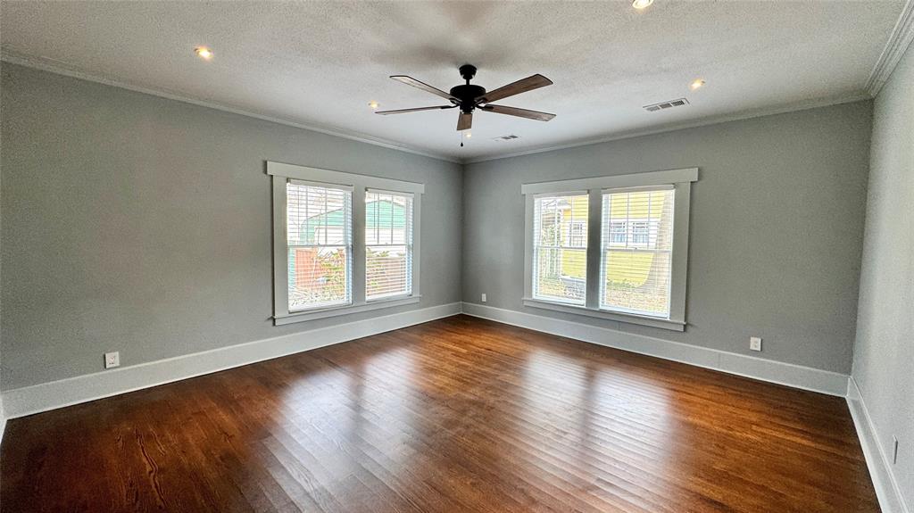218 Elm Drive Terrell, TX 75160 - Photo 15 of 27 a view of wooden floor and windows in a room