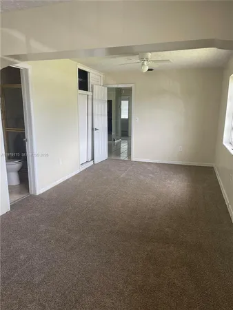 a view of a big room with closet area