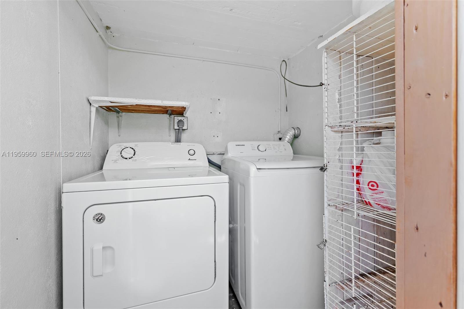 1082 92nd Street, Unit 2 Bay Harbor Islands, FL 33154 - Photo 16 of 19 a utility room with dryer and washer