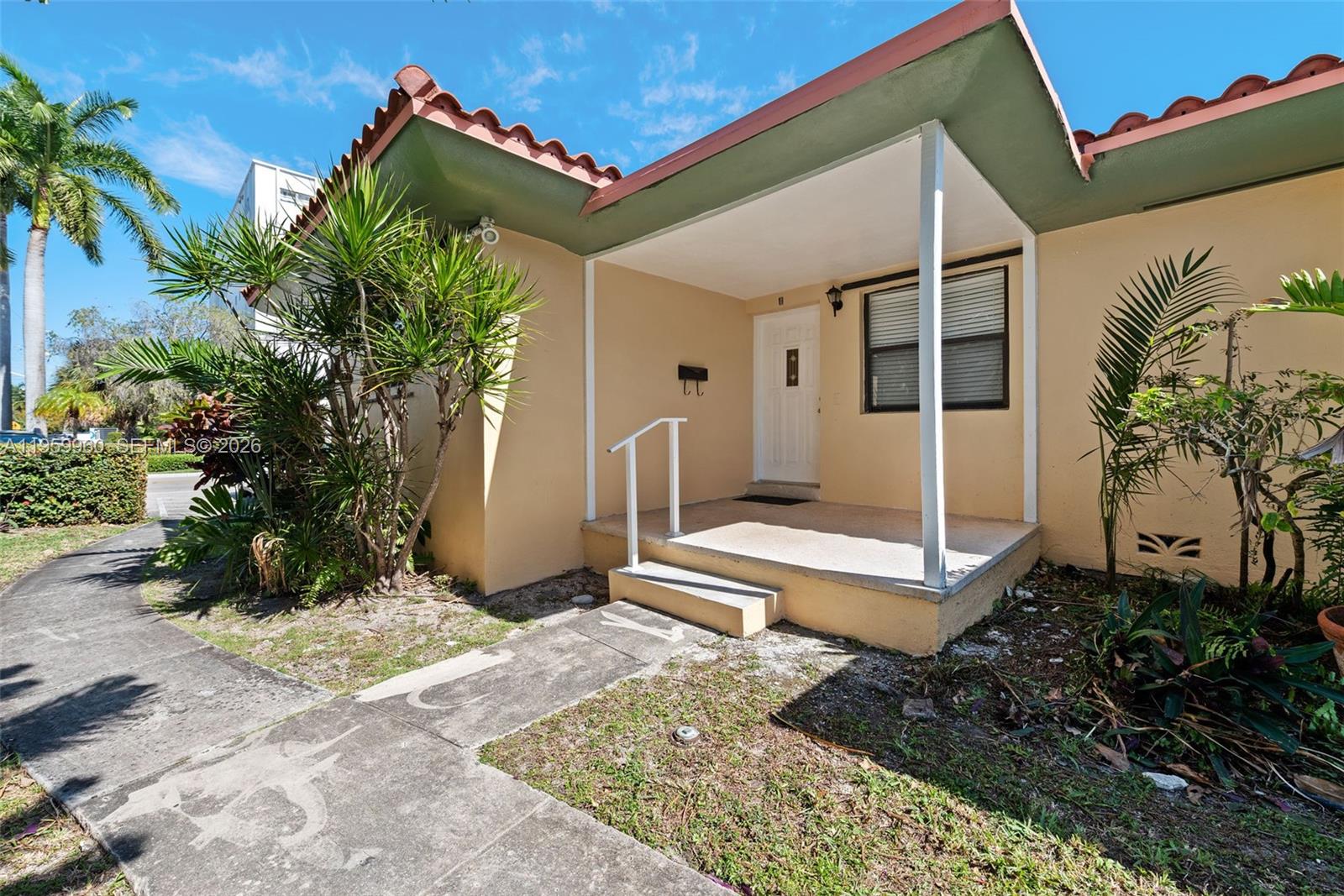 1082 92nd Street, Unit 2 Bay Harbor Islands, FL 33154 - Photo 2 of 19 a front view of a house