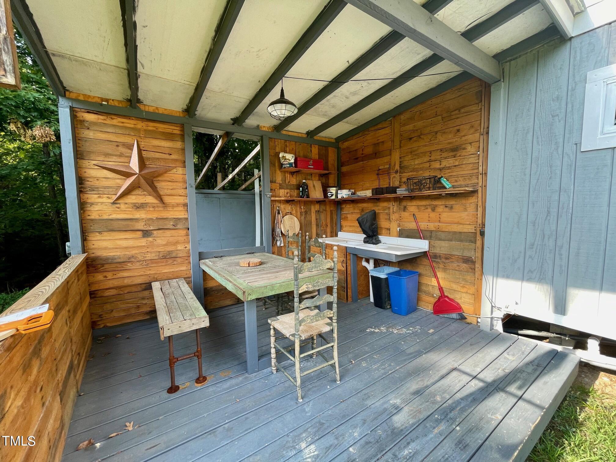 3081 Jacksontown Road Manson, NC 27553 - Photo 3 of 39 a dining room with a table and chairs