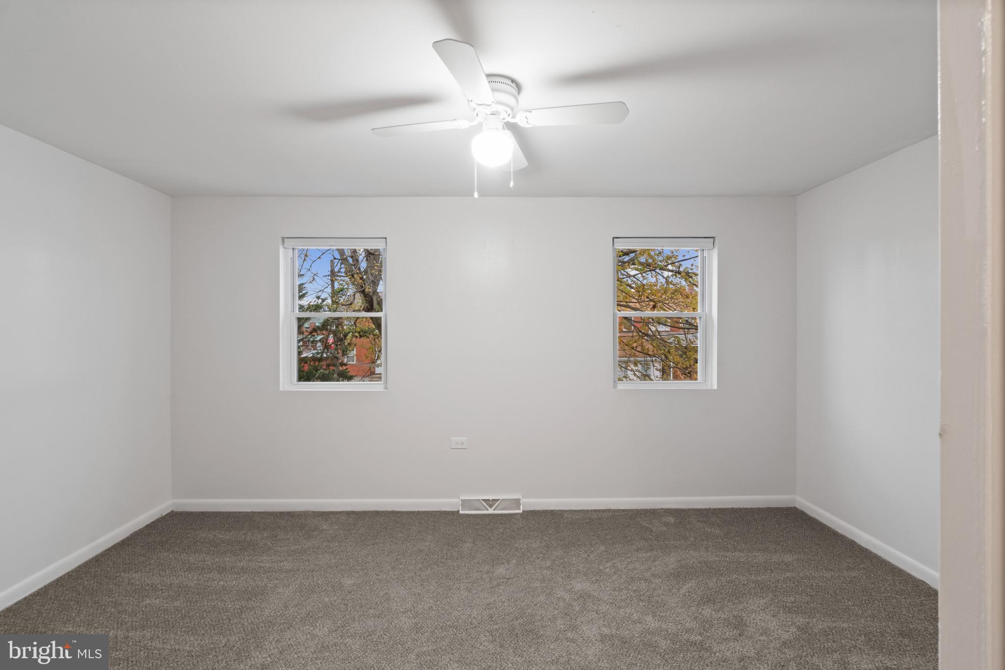 8146 Del Haven Road Baltimore, MD 21222 - Photo 14 of 35 an empty room with a window