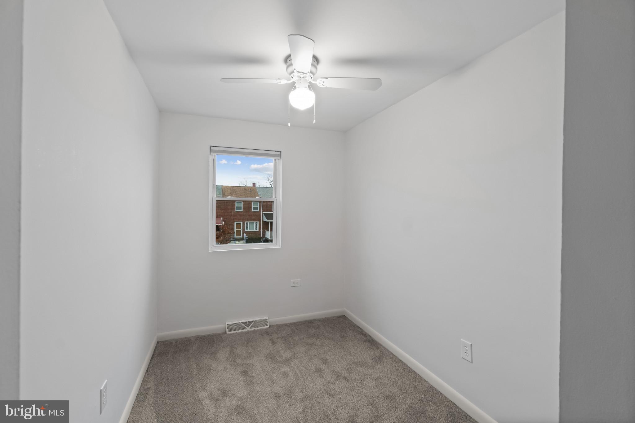 8146 Del Haven Road Baltimore, MD 21222 - Photo 17 of 35 an empty room with a window