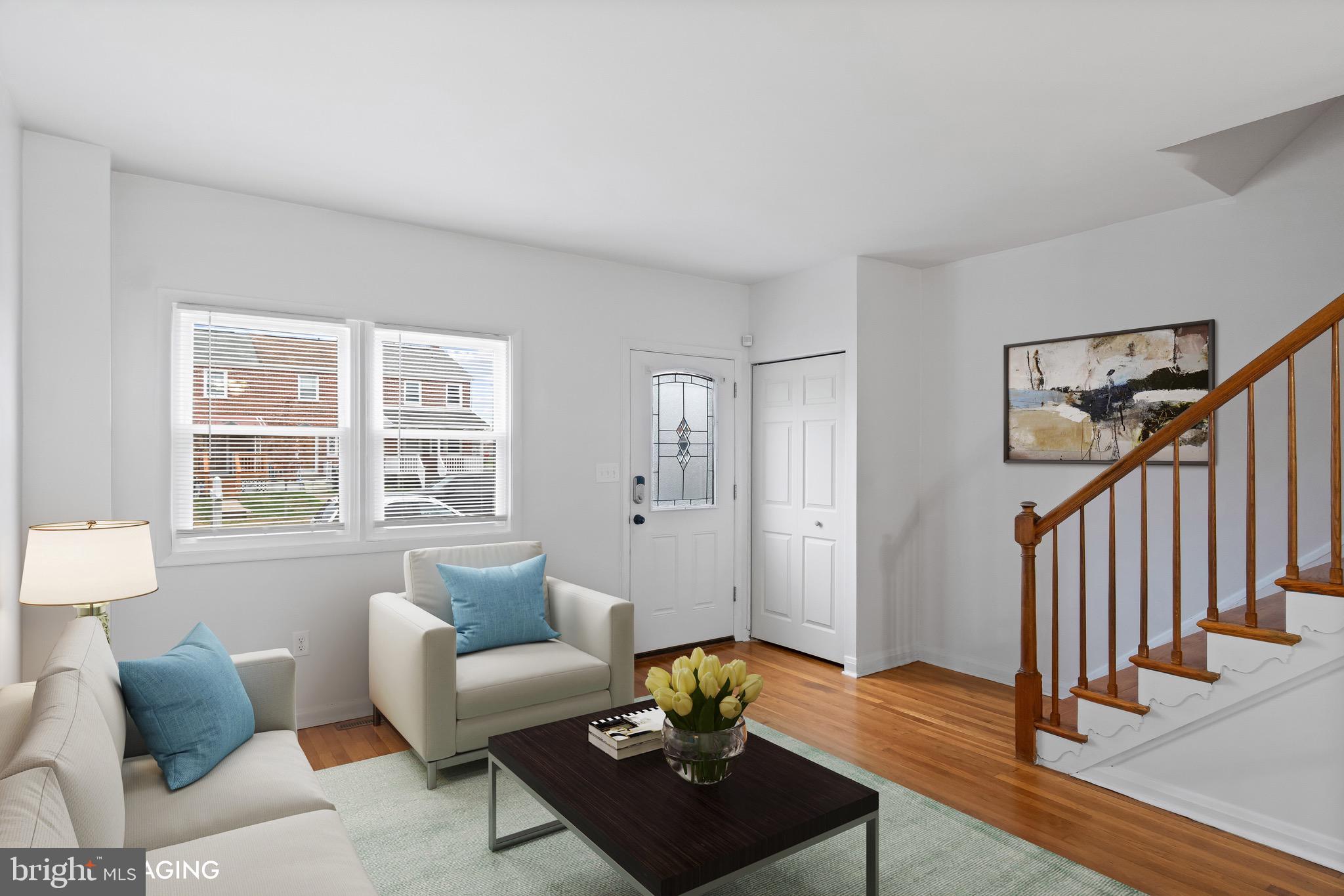 8146 Del Haven Road Baltimore, MD 21222 - Photo 2 of 35 a living room with furniture and wooden floor