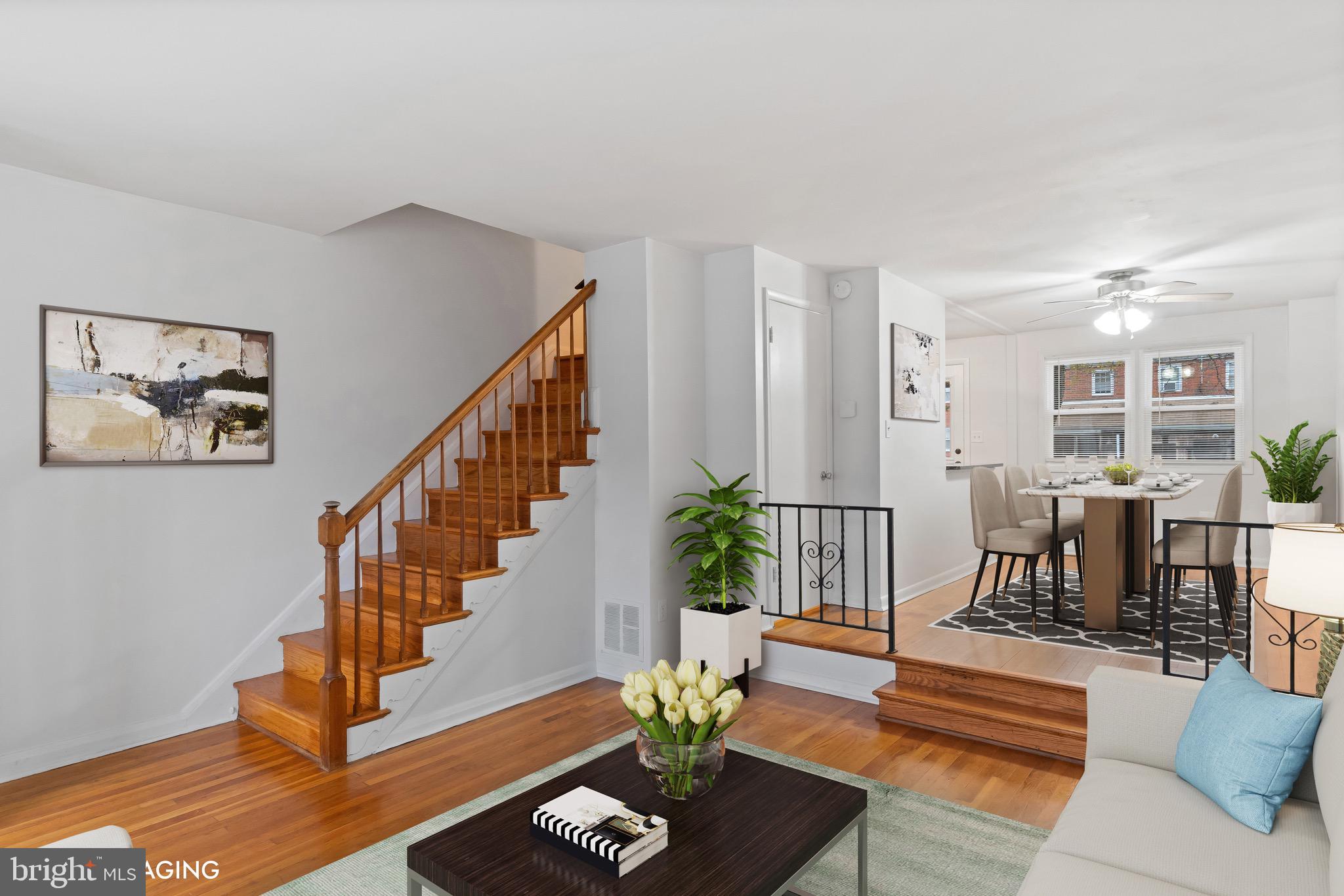 8146 Del Haven Road Baltimore, MD 21222 - Photo 4 of 35 a living room with furniture and wooden floor