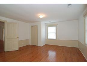 5001 Green Riley Road Rougemont, NC 27572 - Photo 11 of 23 a view of an empty room with wooden floor and a window