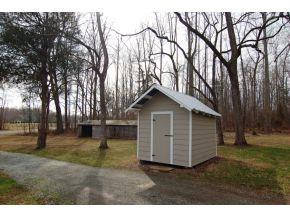 5001 Green Riley Road Rougemont, NC 27572 - Photo 21 of 23 a view of a backyard with large trees