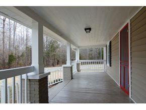 5001 Green Riley Road Rougemont, NC 27572 - Photo 3 of 23 a view of hallway with wooden floor and furniture