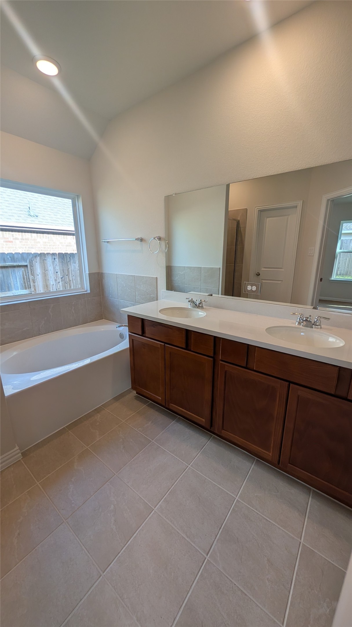 32314 Mimosa Ridge Lane Waller, TX 77484 - Photo 6 of 16 a bathroom with a tub sink and mirror