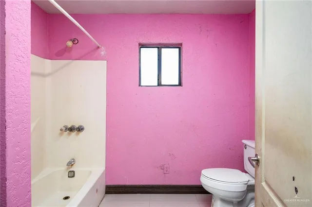 a bathroom with a bath tub