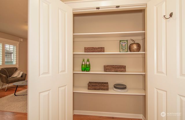 a shelf with books and knick knacks on it