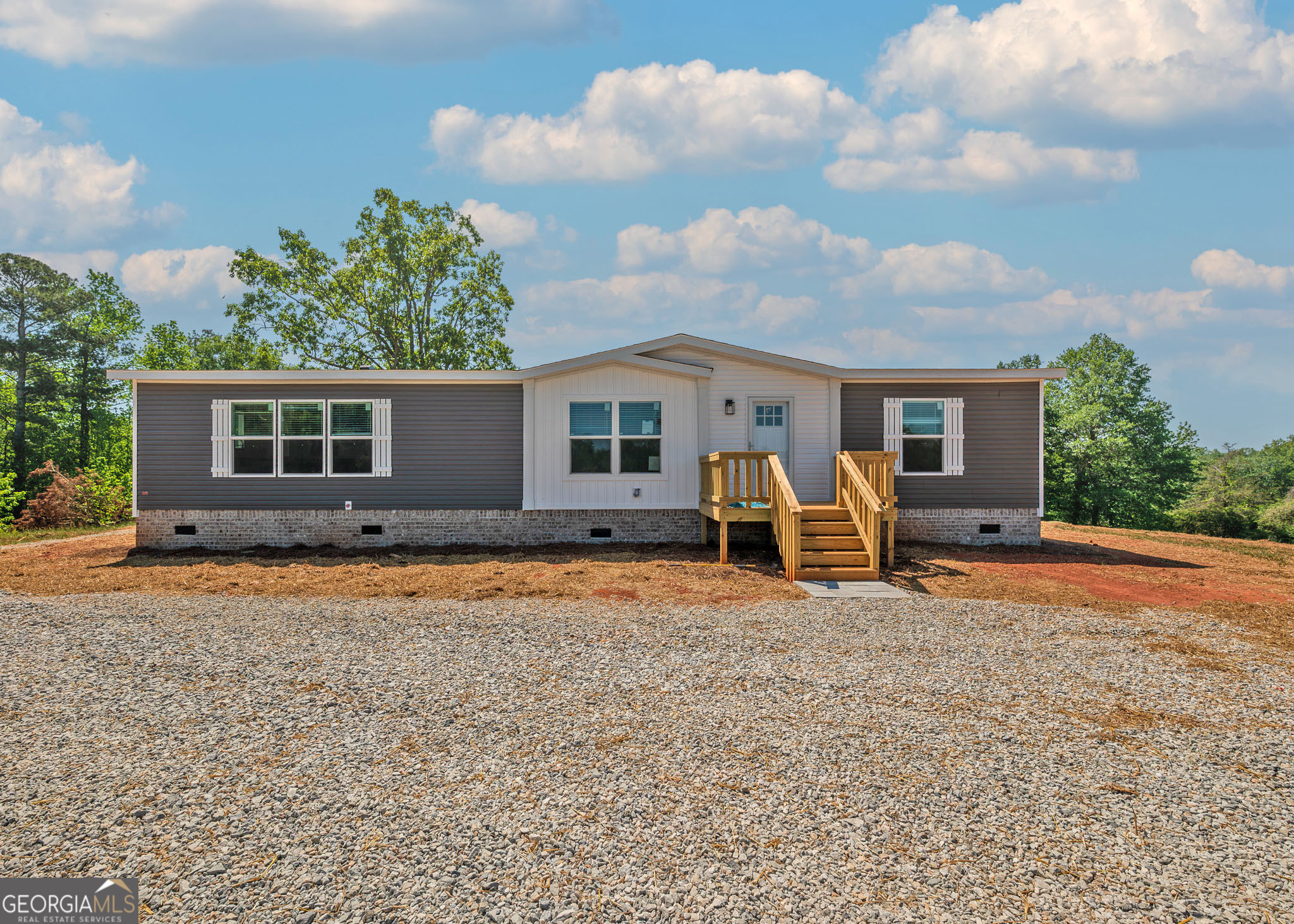 413 Griffin Road Martin, GA 30557 - Photo 1 of 31 front view of a house with potted plants and a yard
