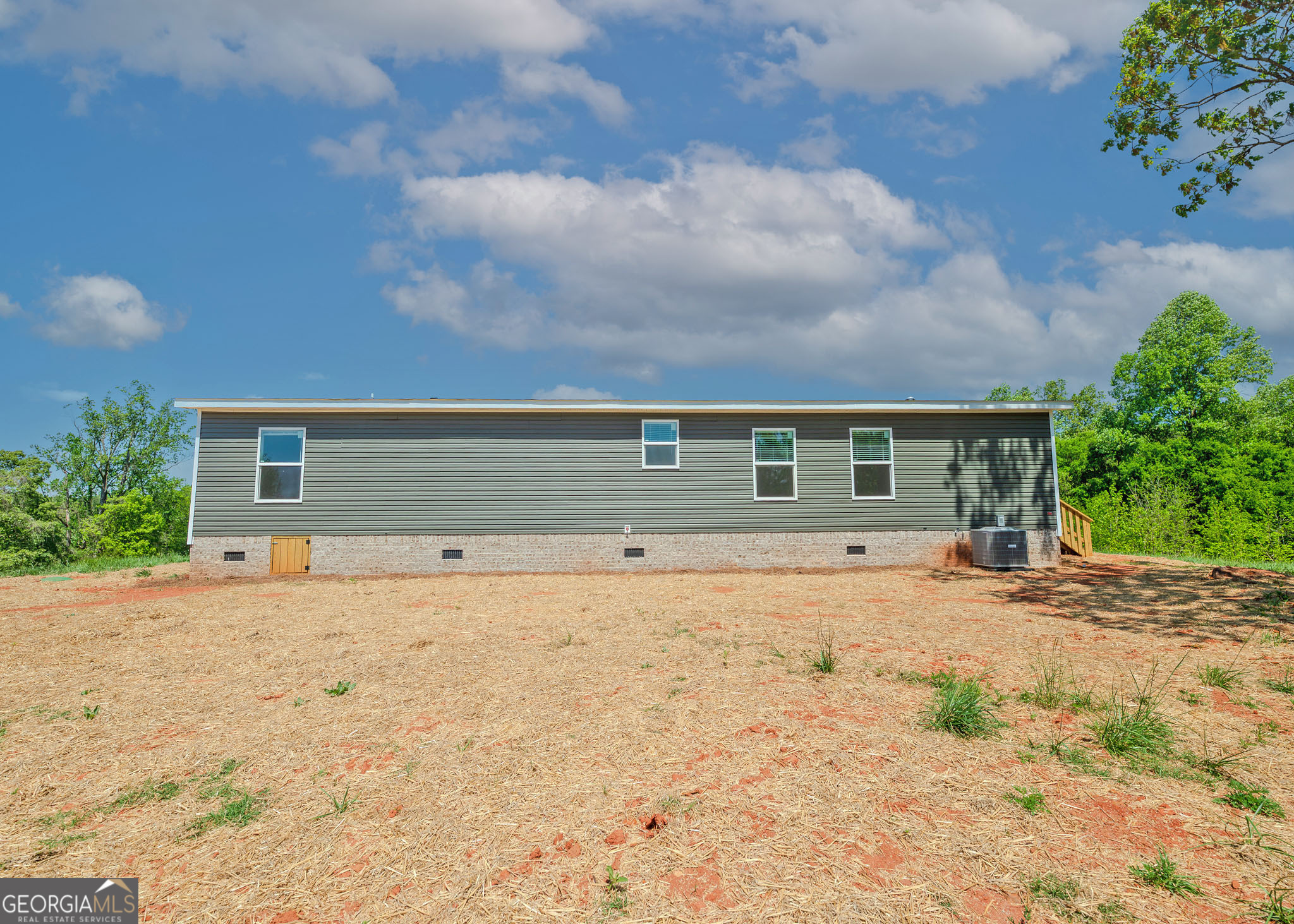 413 Griffin Road Martin, GA 30557 - Photo 30 of 31 a front view of a house with a yard