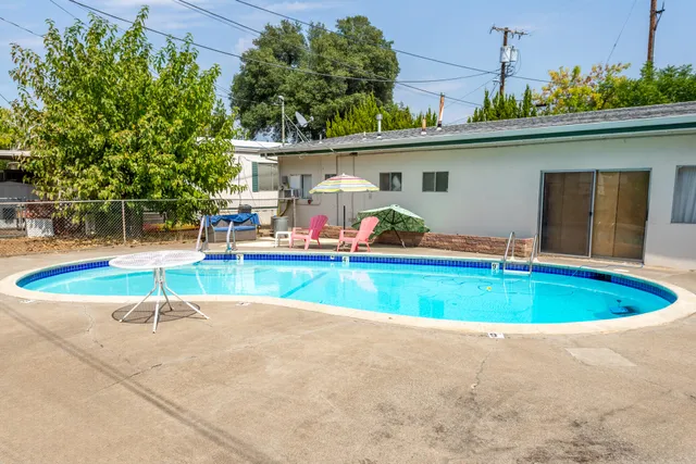 a view of outdoor space with swimming pool