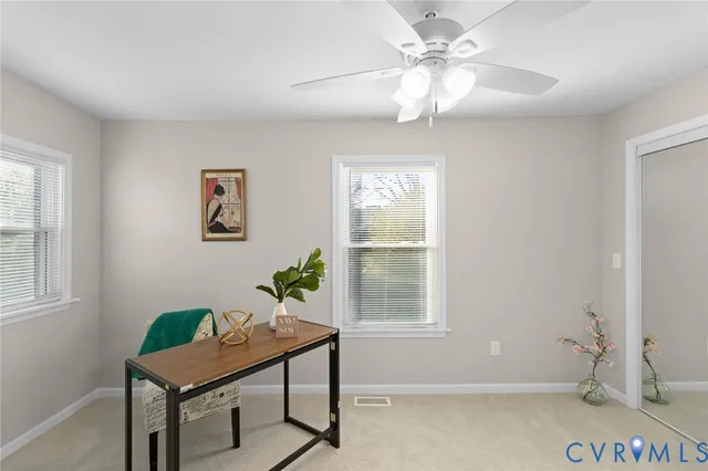 a view of entryway with livingroom