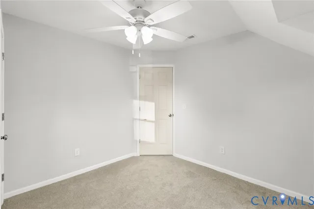 a bathroom with a bathtub a sink a white and a shower