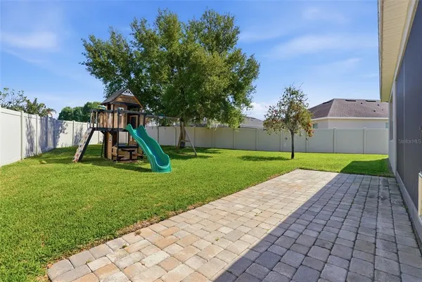 a view of a park with swings