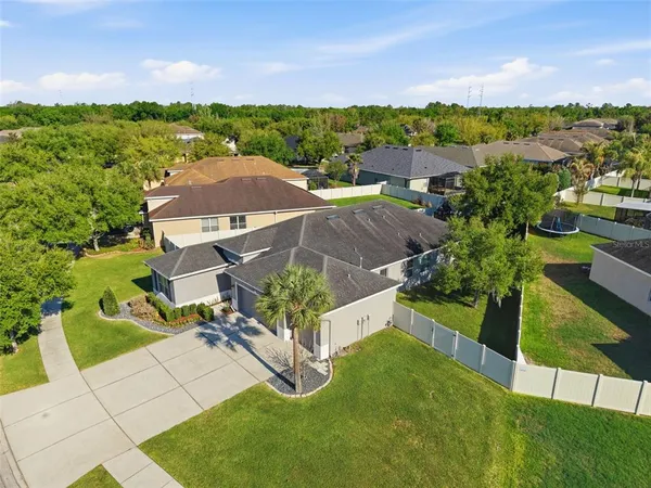 a view of houses with yard