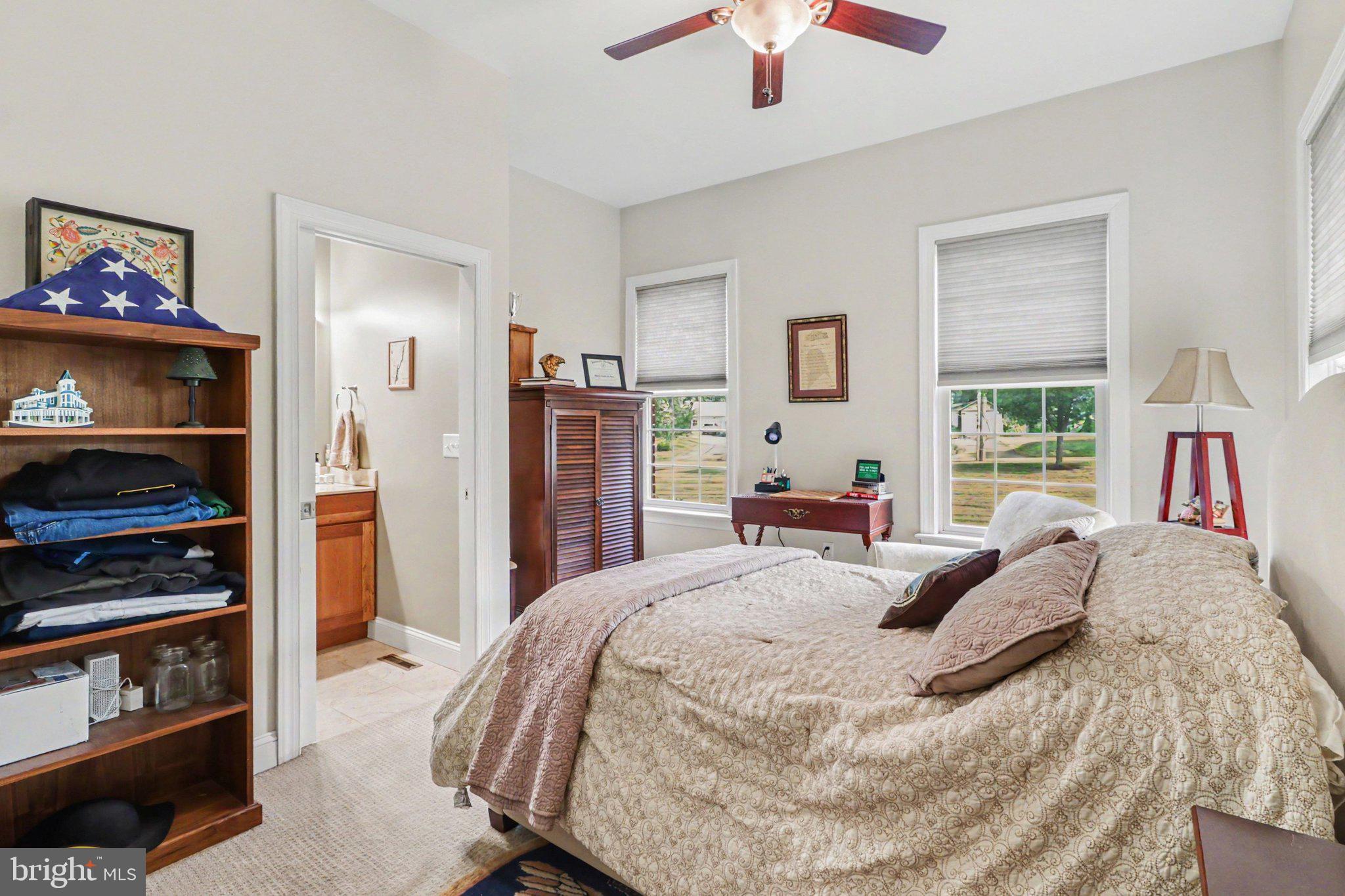 1080 Swatara Road Hershey, PA 17033 - Photo 19 of 59 a bedroom with a bed and a flat screen tv
