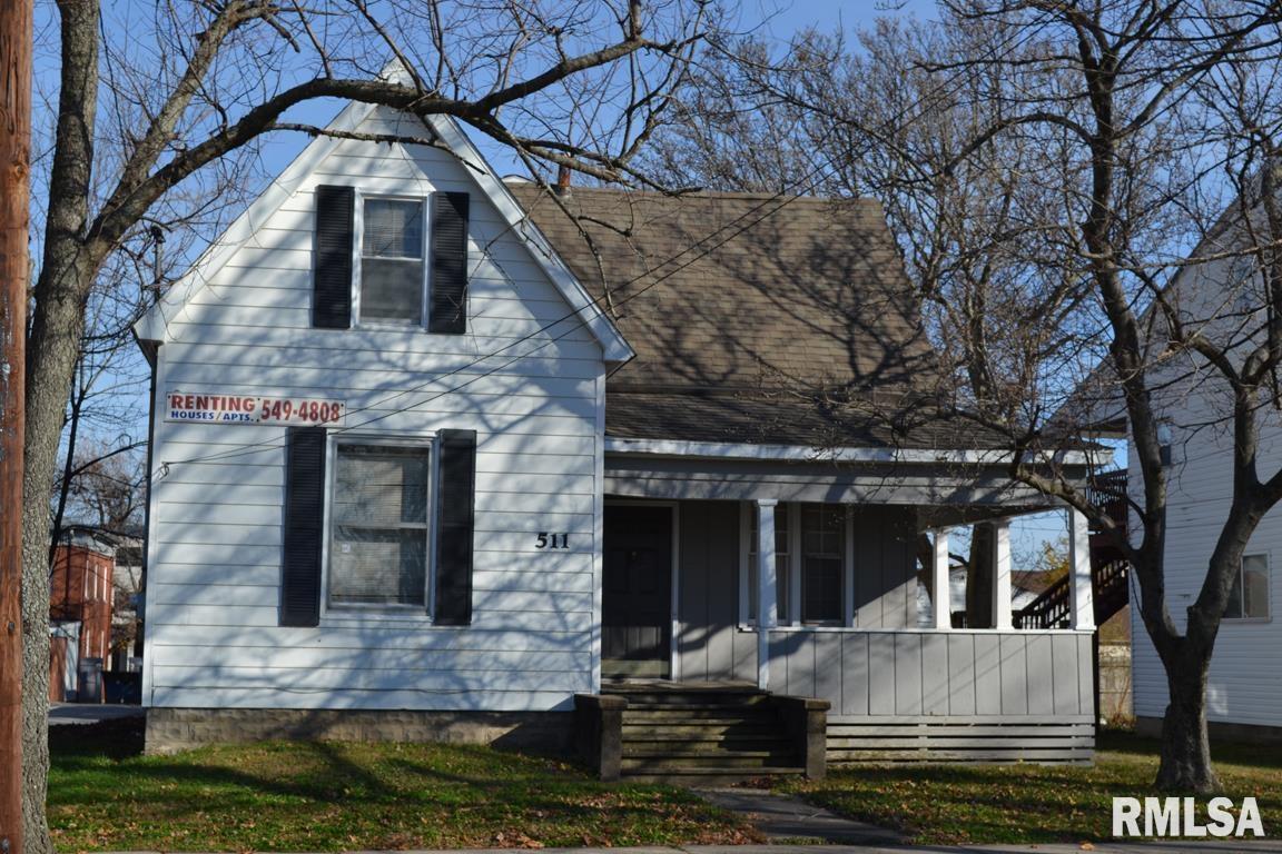 511 South Ash Street, Unit 3 Carbondale, IL 62901 - Photo 1 of 17 a front view of a house with a yard