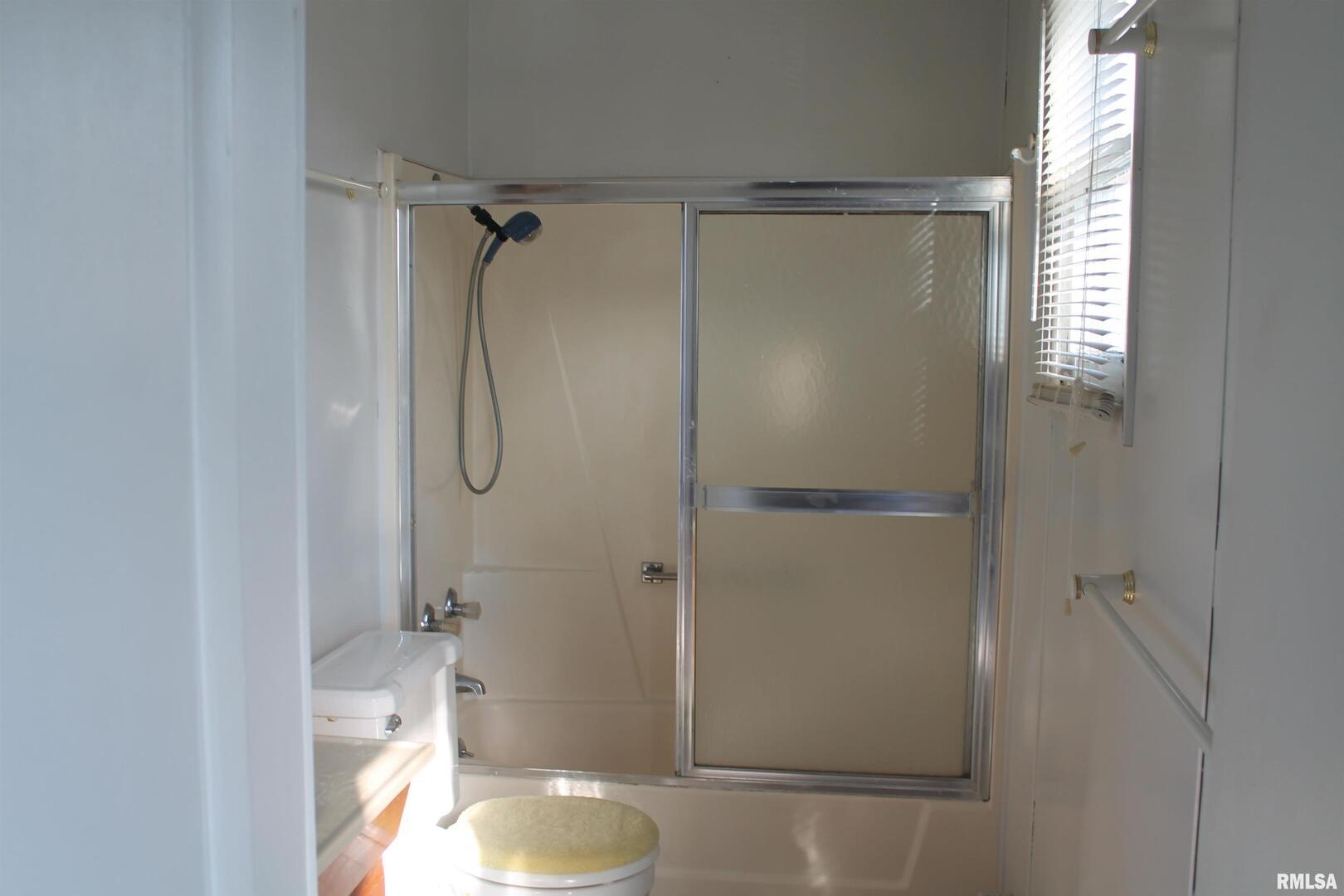 511 South Ash Street, Unit 3 Carbondale, IL 62901 - Photo 12 of 17 a bathroom with a shower and a toilet