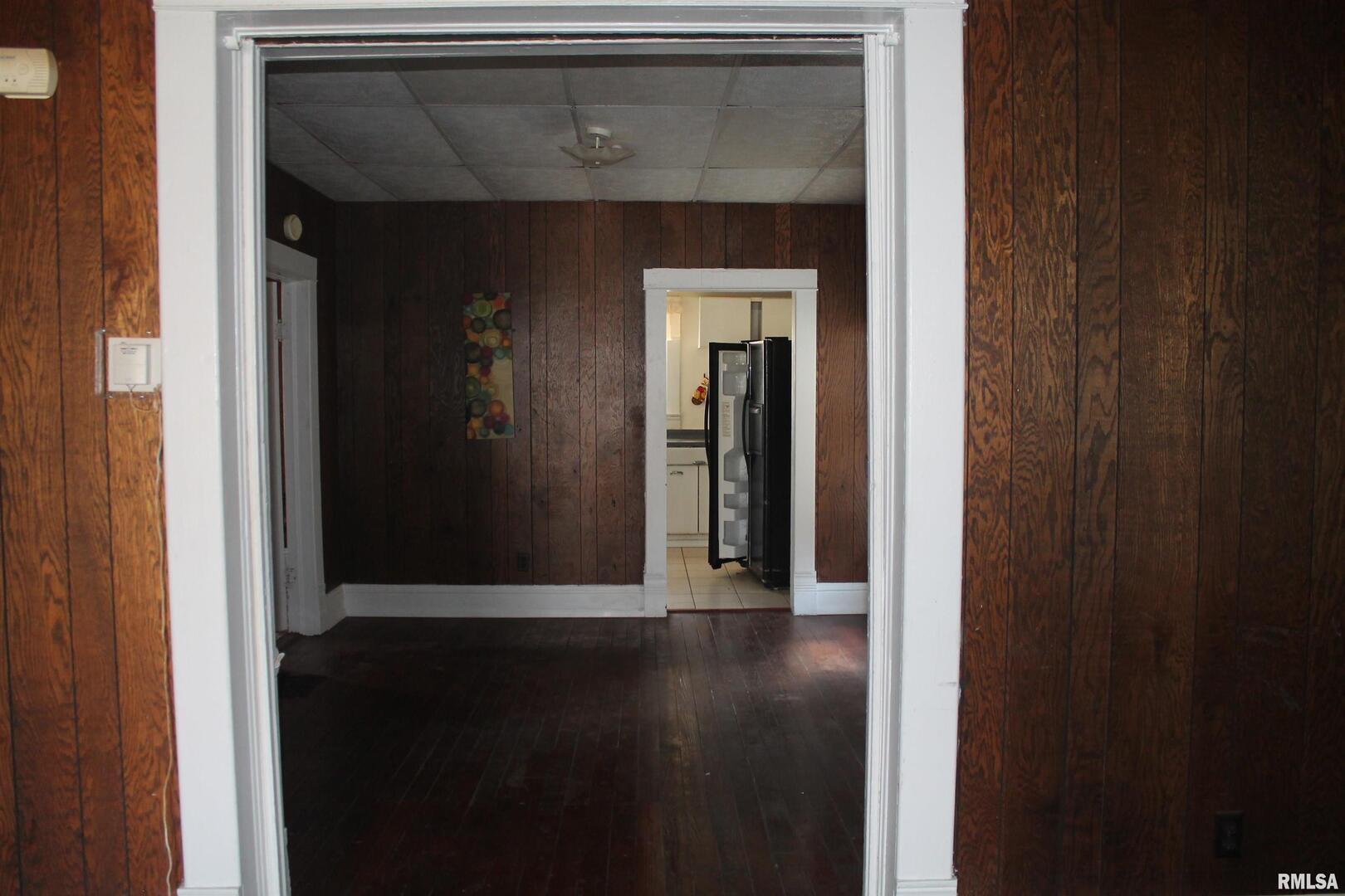 511 South Ash Street, Unit 3 Carbondale, IL 62901 - Photo 4 of 17 a view of a hallway with wooden floor