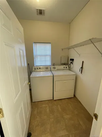 a kitchen with stainless steel appliances granite countertop a sink and a stove