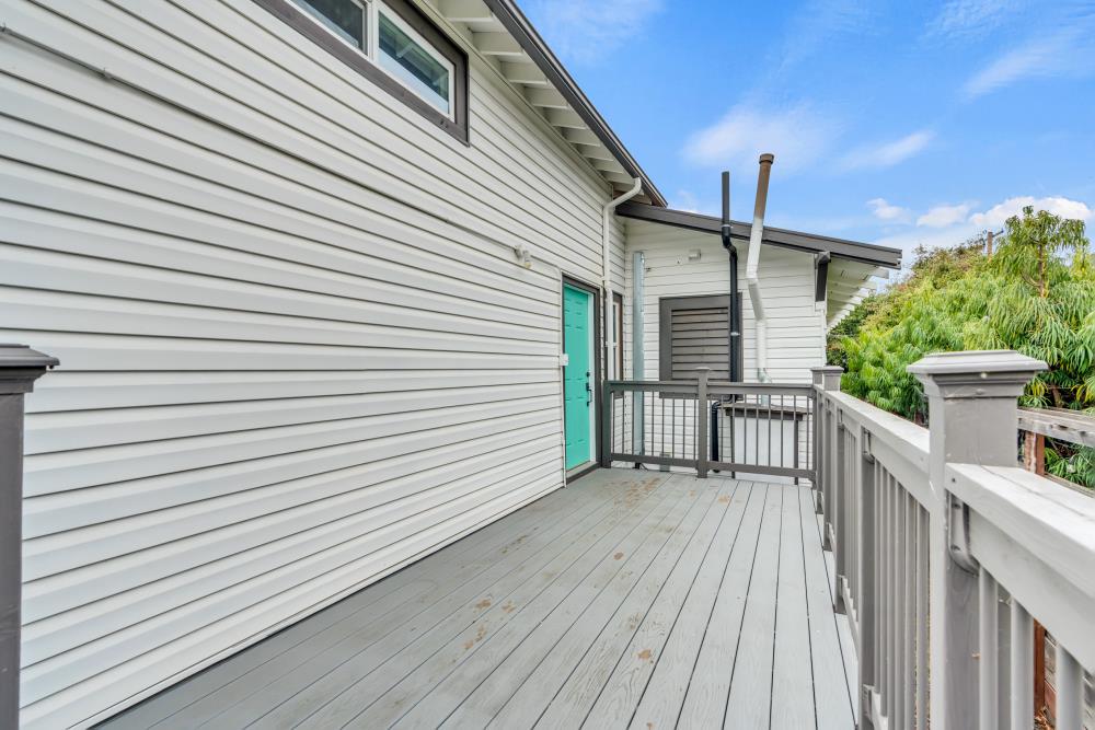 2437 Acton Street Berkeley, CA 94702 - Photo 29 of 54 a view of a house with wooden deck