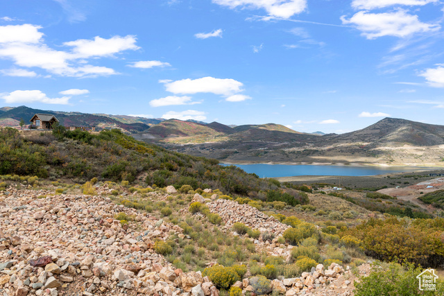 10677 North Reflection Ridge, Unit 1 Hideout, UT 84036 - Photo 28 of 41 View of mountain background with a large body of water