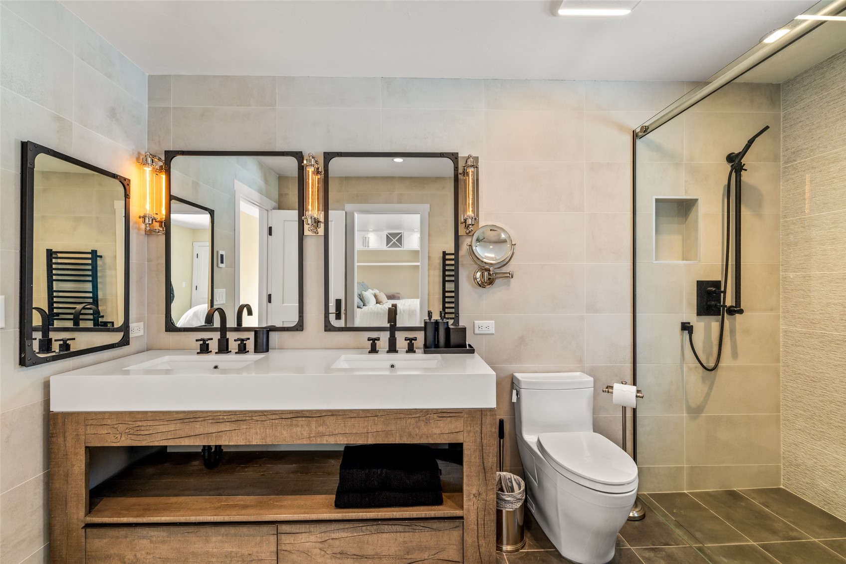 31655 Sugar Ridge Road Steamboat Springs, CO 80487 - Photo 46 of 49 a bathroom with a sink toilet a mirror and shower