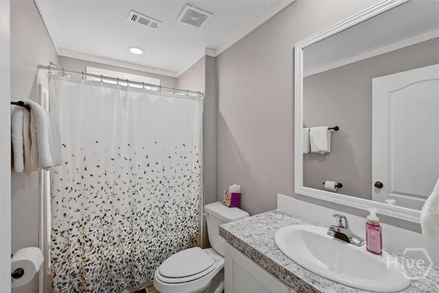 $310,000 | 305 Magnolia Drive North, Guyton, GA 31312