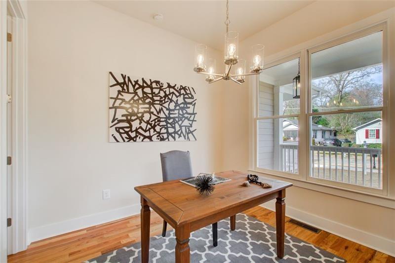 1240 Oakland Terrace Southwest, Unit B Atlanta, GA 30310 - Photo 11 of 43 a view of a workspace with furniture and a window