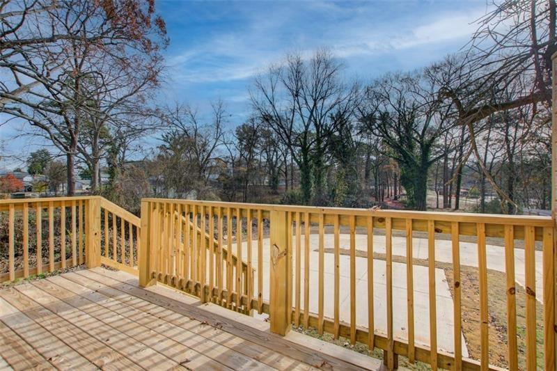 1240 Oakland Terrace Southwest, Unit B Atlanta, GA 30310 - Photo 21 of 43 a view of a balcony with large trees