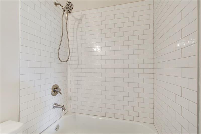 1240 Oakland Terrace Southwest, Unit B Atlanta, GA 30310 - Photo 25 of 43 a bathroom with a shower