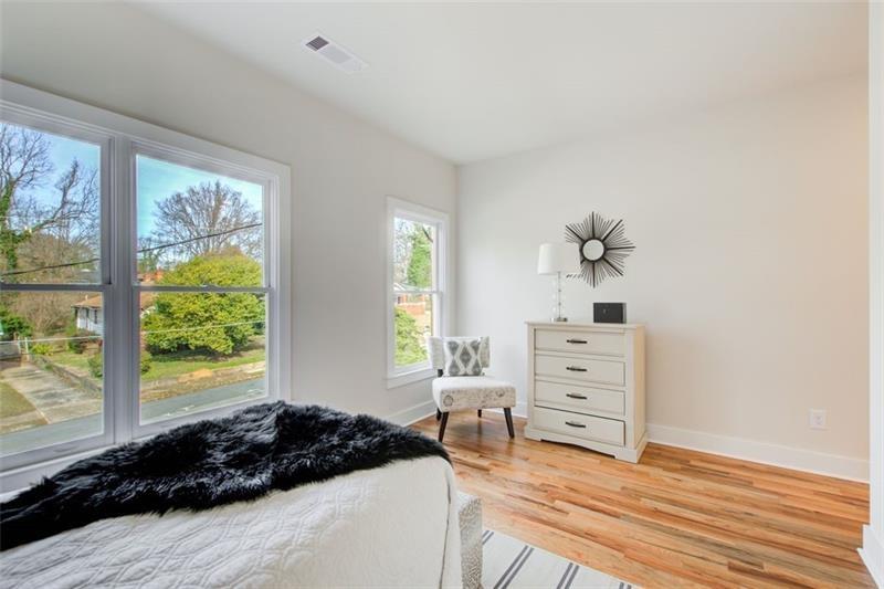 1240 Oakland Terrace Southwest, Unit B Atlanta, GA 30310 - Photo 27 of 43 a bedroom with a bed and a window