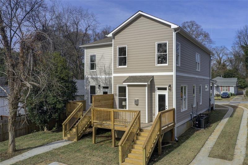 1240 Oakland Terrace Southwest, Unit B Atlanta, GA 30310 - Photo 37 of 43 a view of a house with a yard