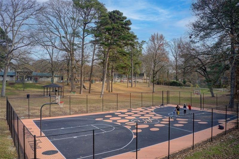 1240 Oakland Terrace Southwest, Unit B Atlanta, GA 30310 - Photo 41 of 43 a view of a lake with a bench