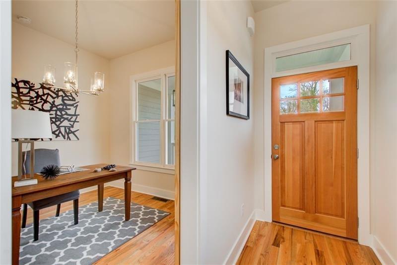 1240 Oakland Terrace Southwest, Unit B Atlanta, GA 30310 - Photo 8 of 43 a view of a bedroom with a bed and a window