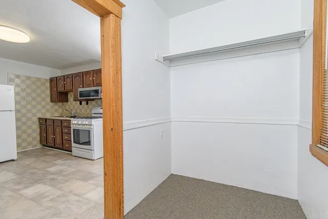 a view of a storage & utility room with washer and dryer