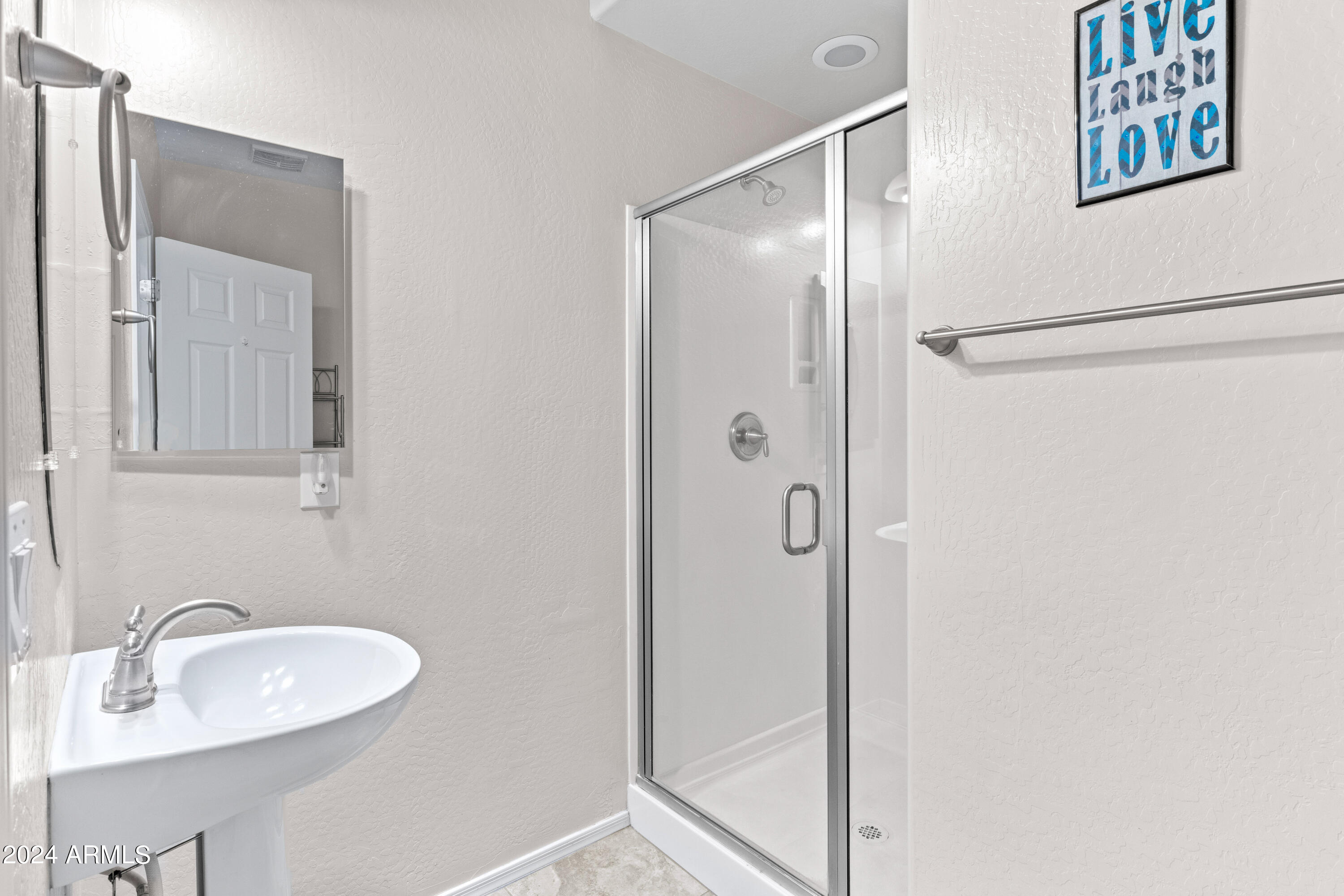 5515 West Hackamore Drive Phoenix, AZ 85083 - Photo 13 of 35 a bathroom with a sink and mirror