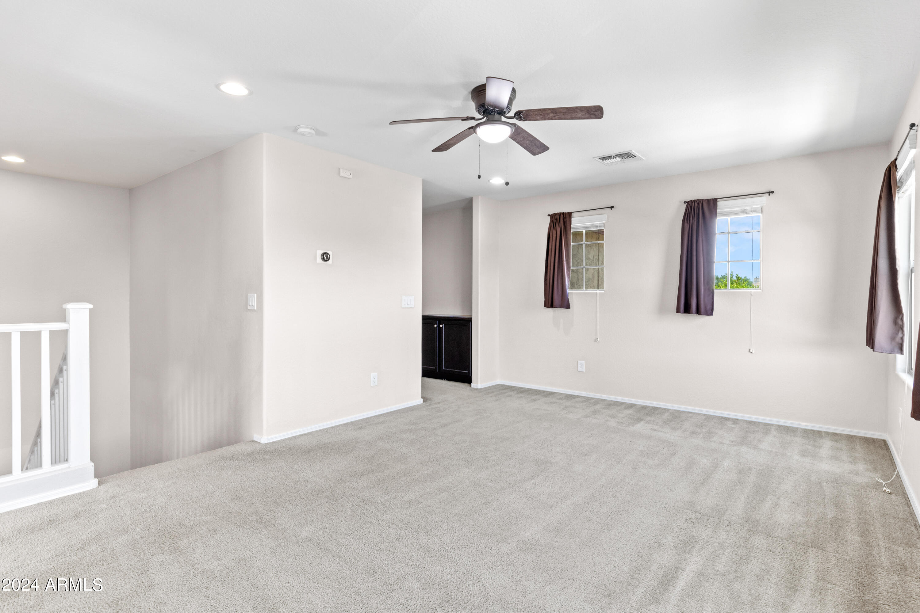 5515 West Hackamore Drive Phoenix, AZ 85083 - Photo 14 of 35 a view of an empty room with a window