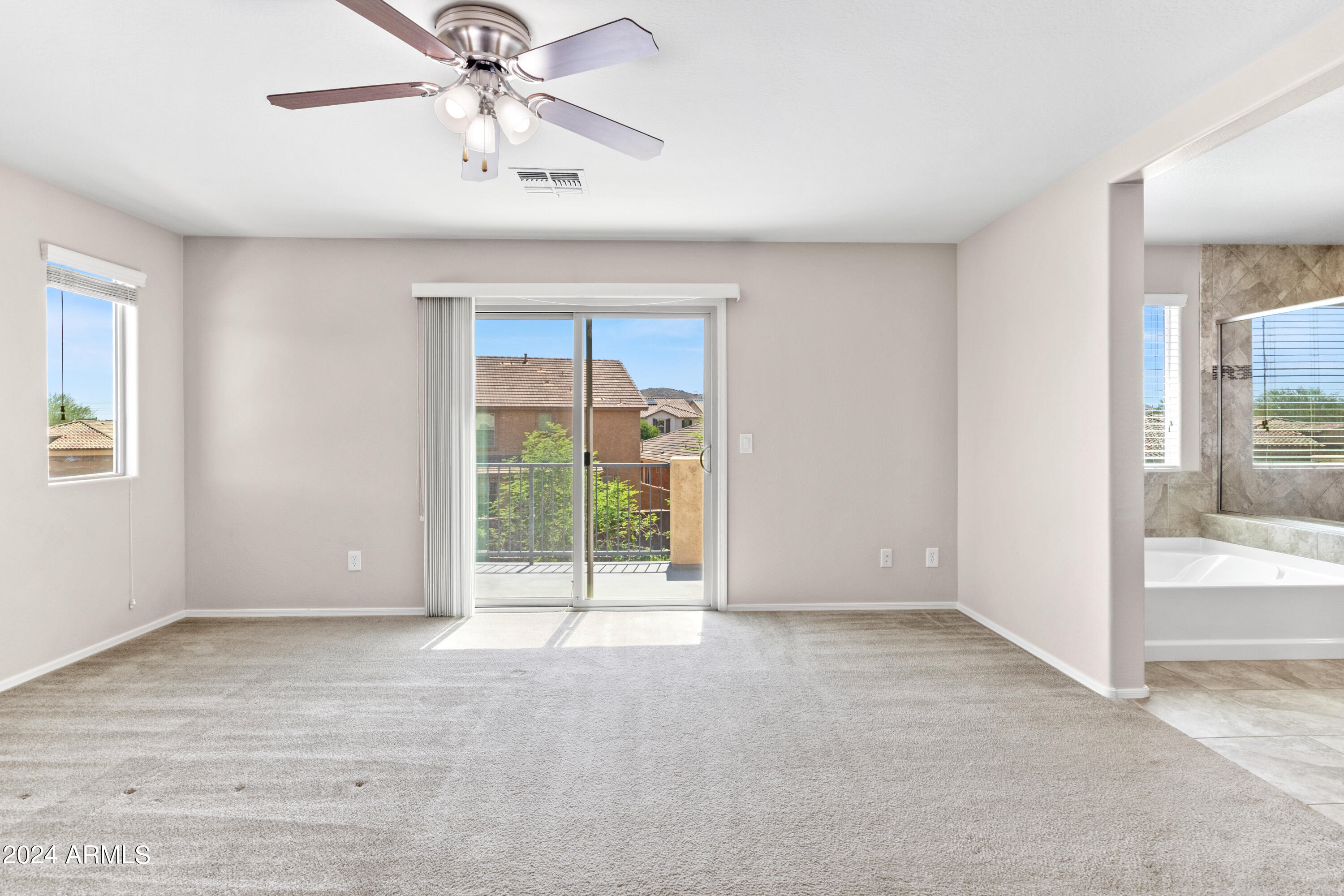 5515 West Hackamore Drive Phoenix, AZ 85083 - Photo 16 of 35 a view of an empty room with a window