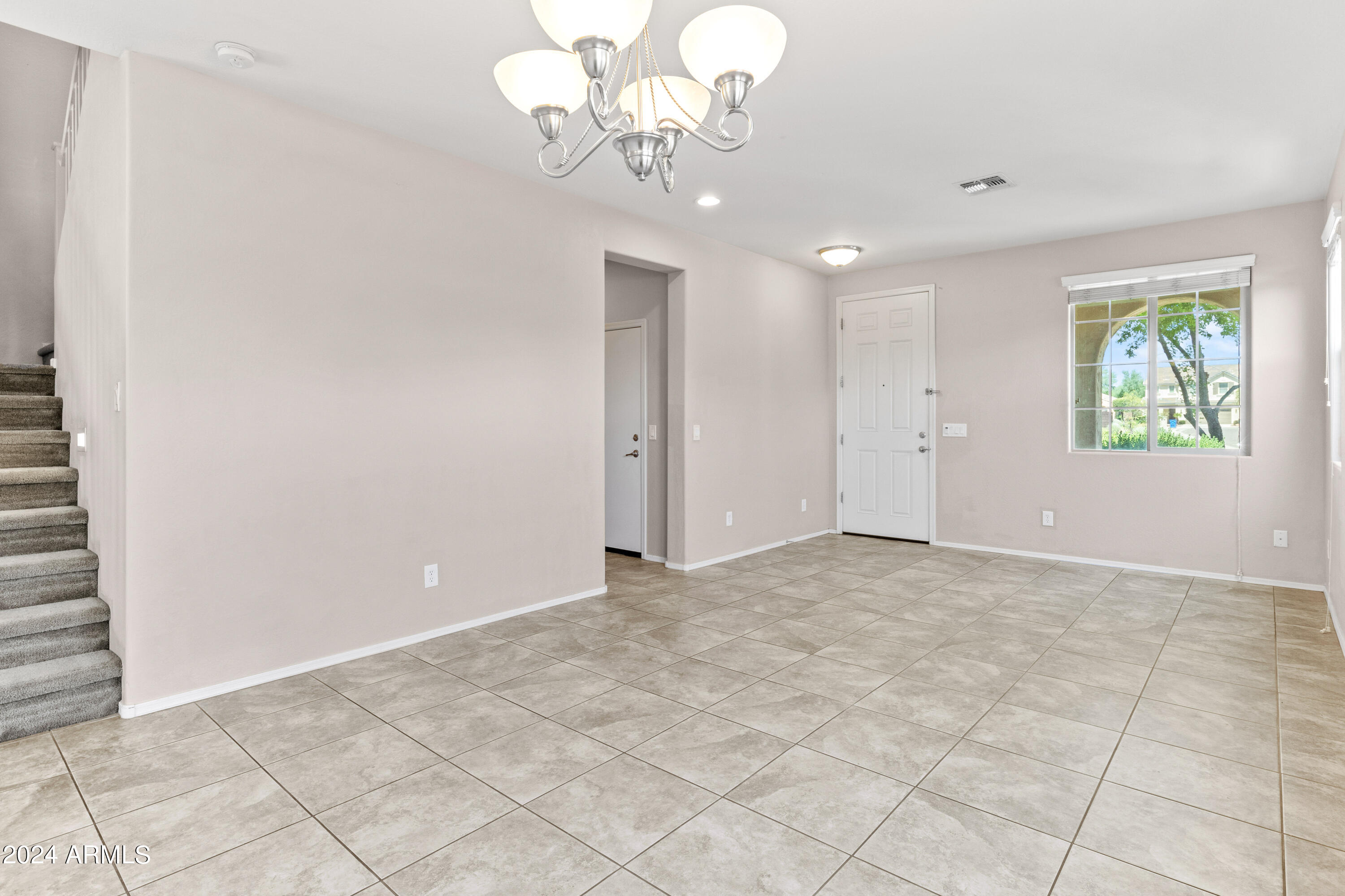5515 West Hackamore Drive Phoenix, AZ 85083 - Photo 2 of 35 a view of an empty room with a window