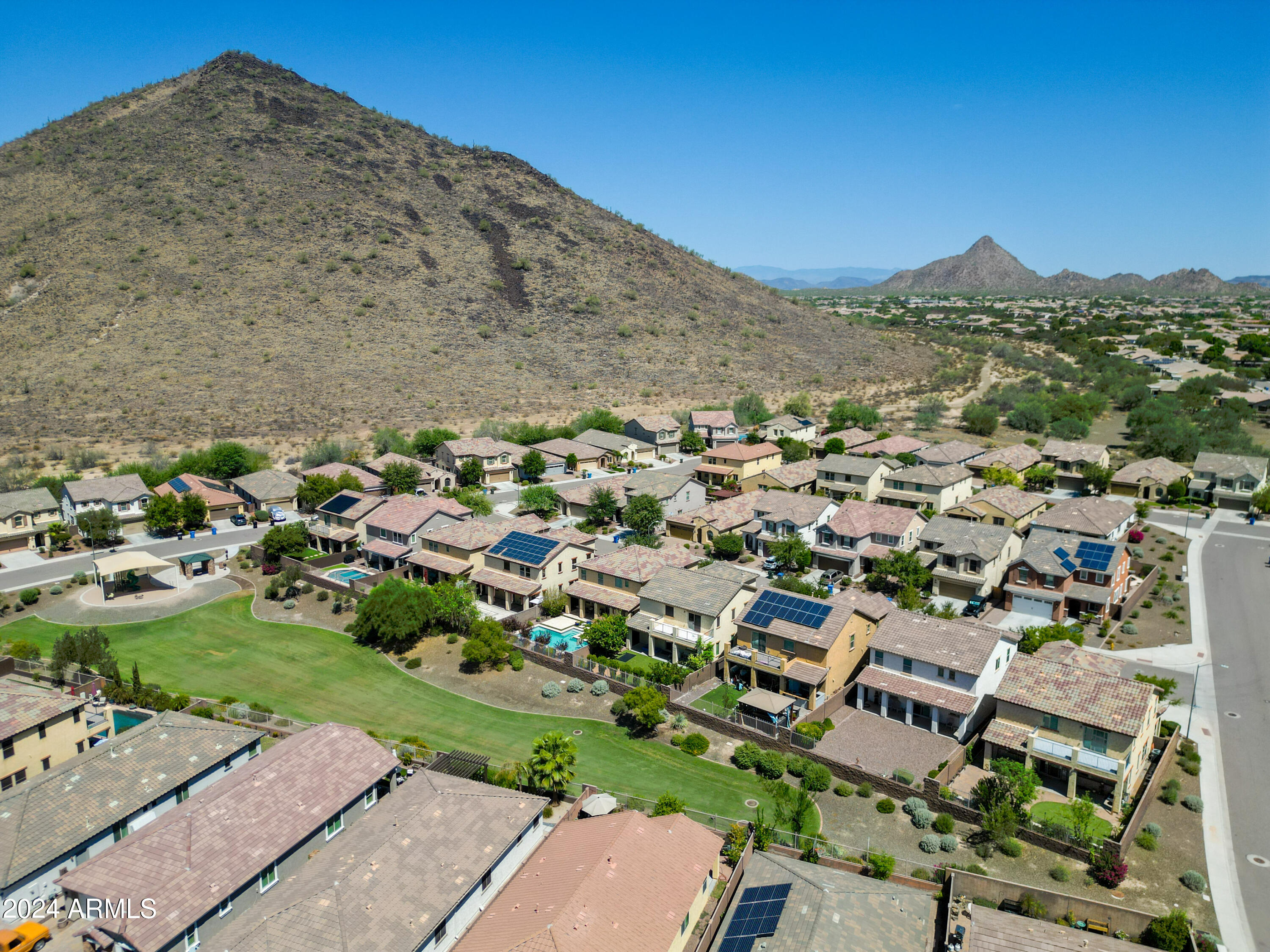 5515 West Hackamore Drive Phoenix, AZ 85083 - Photo 33 of 35 an aerial view of residential houses with outdoor space and trees