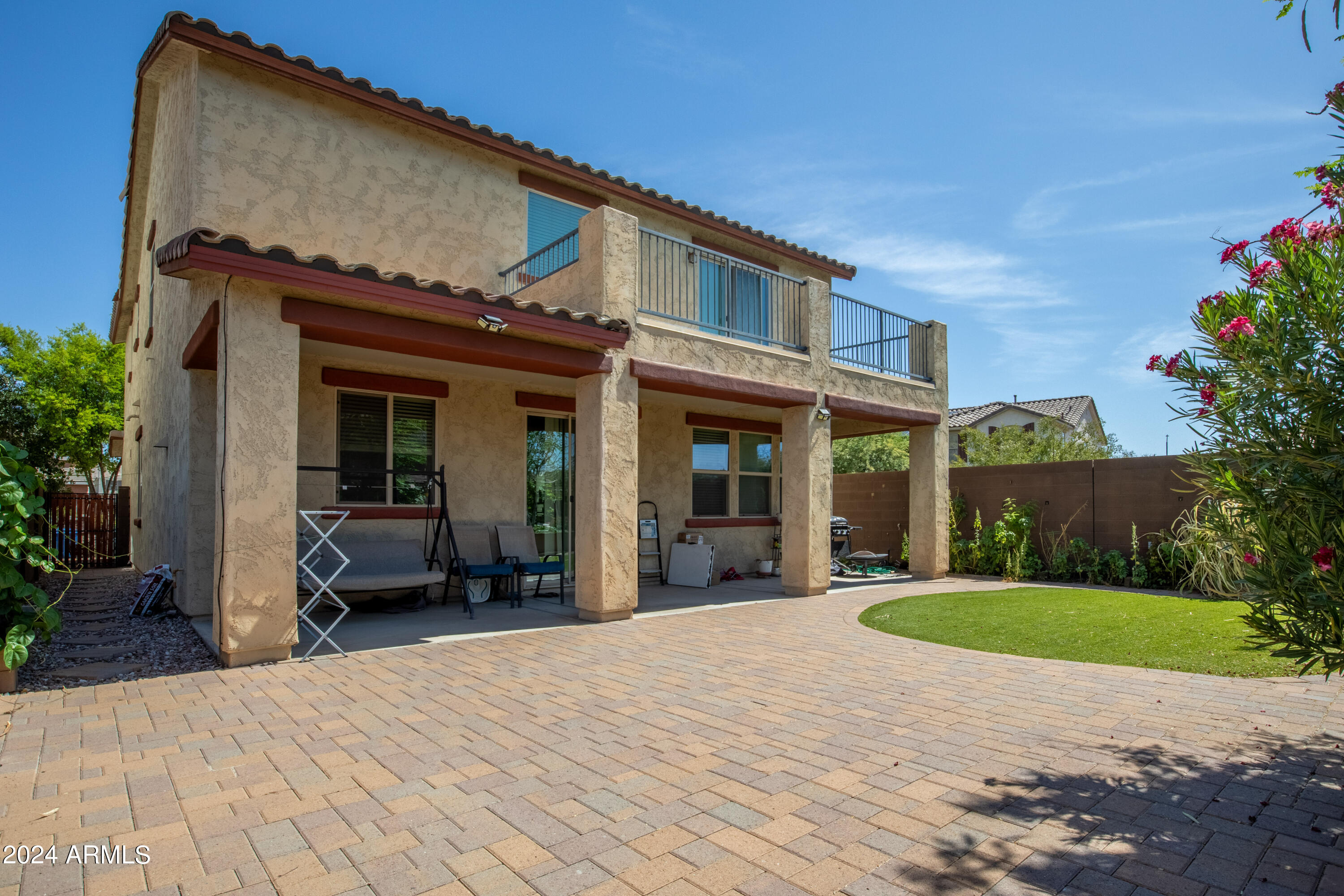5515 West Hackamore Drive Phoenix, AZ 85083 - Photo 8 of 35 a view of a house with potted plants and a sink