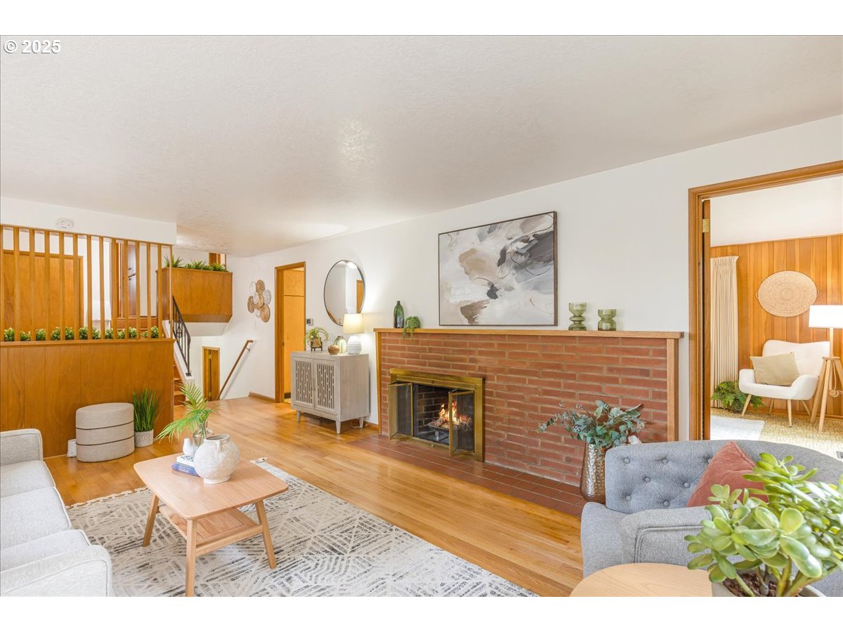 11030 Northeast Davis Street Portland, OR 97220 - Photo 16 of 48 a living room with furniture and wooden floor