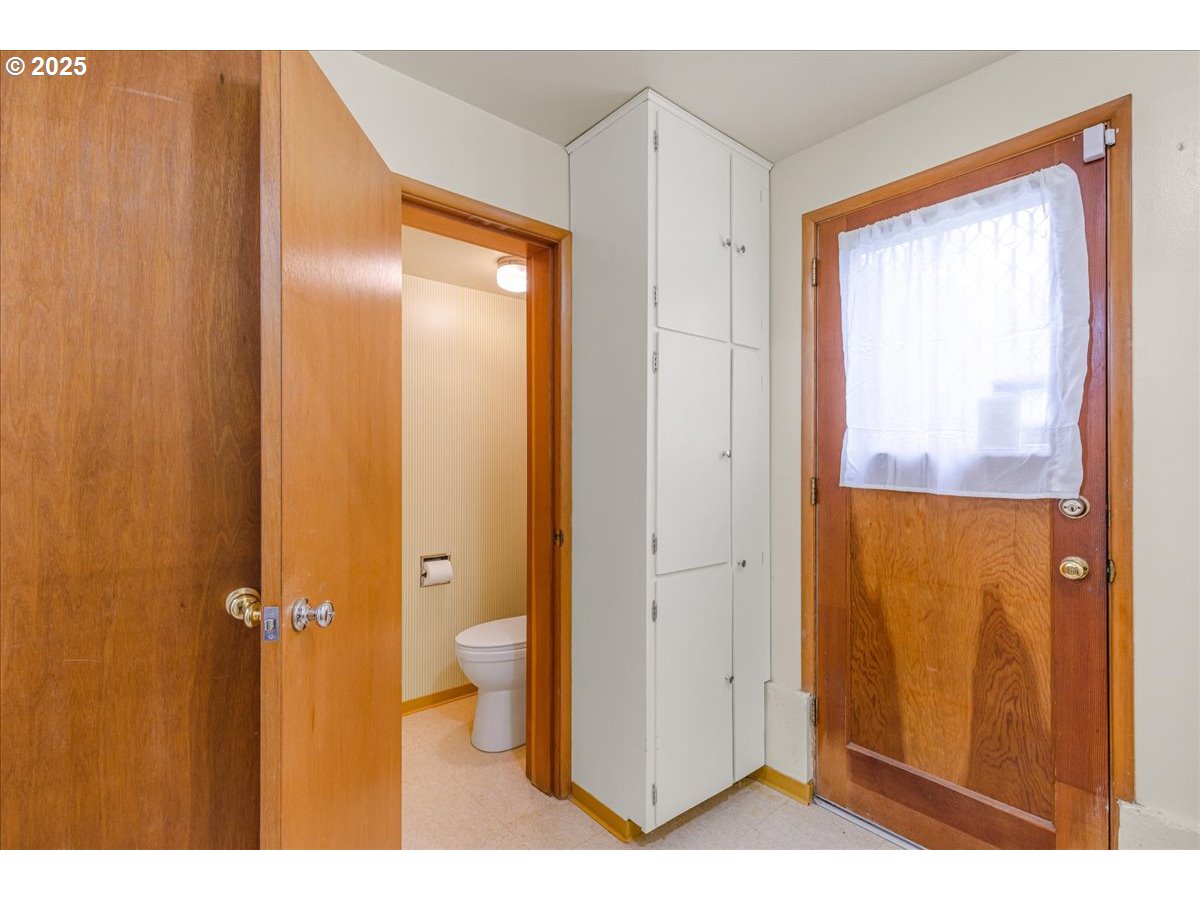 11030 Northeast Davis Street Portland, OR 97220 - Photo 32 of 48 a view of bathroom with a shower curtain