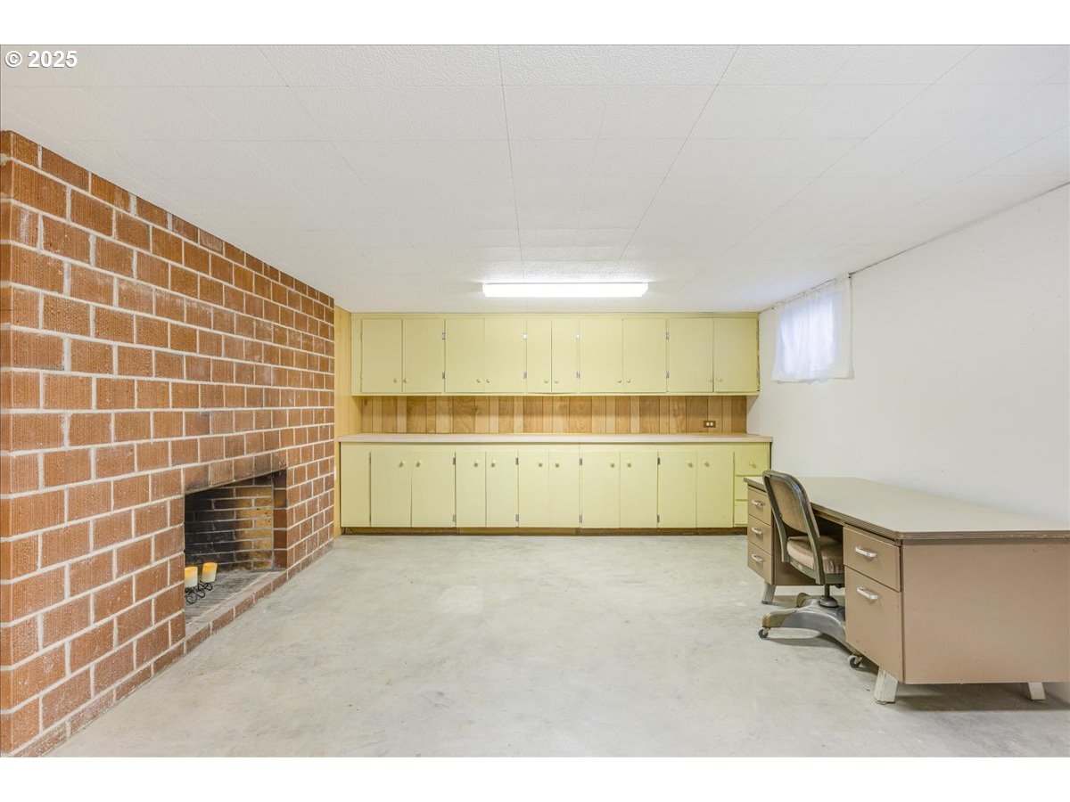 11030 Northeast Davis Street Portland, OR 97220 - Photo 35 of 48 a view of empty room with cabinet and utility room