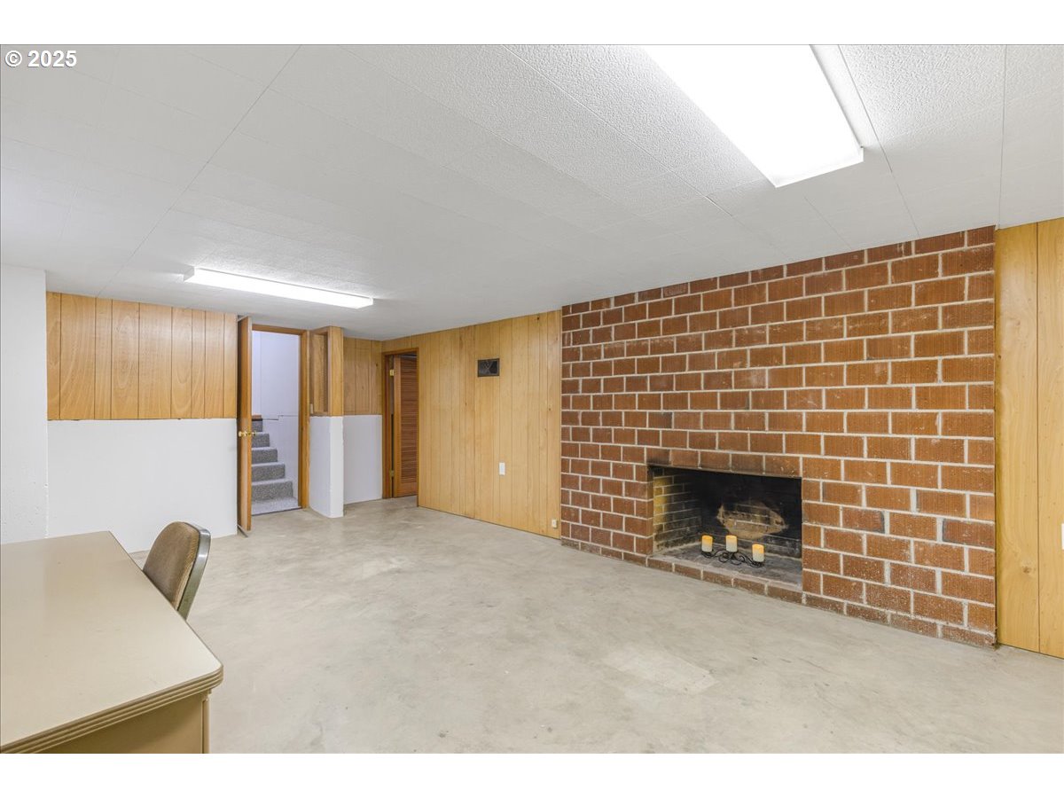 11030 Northeast Davis Street Portland, OR 97220 - Photo 37 of 48 a view of an empty room with a fireplace